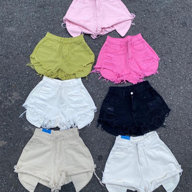 Quần short jean rách lộ túi