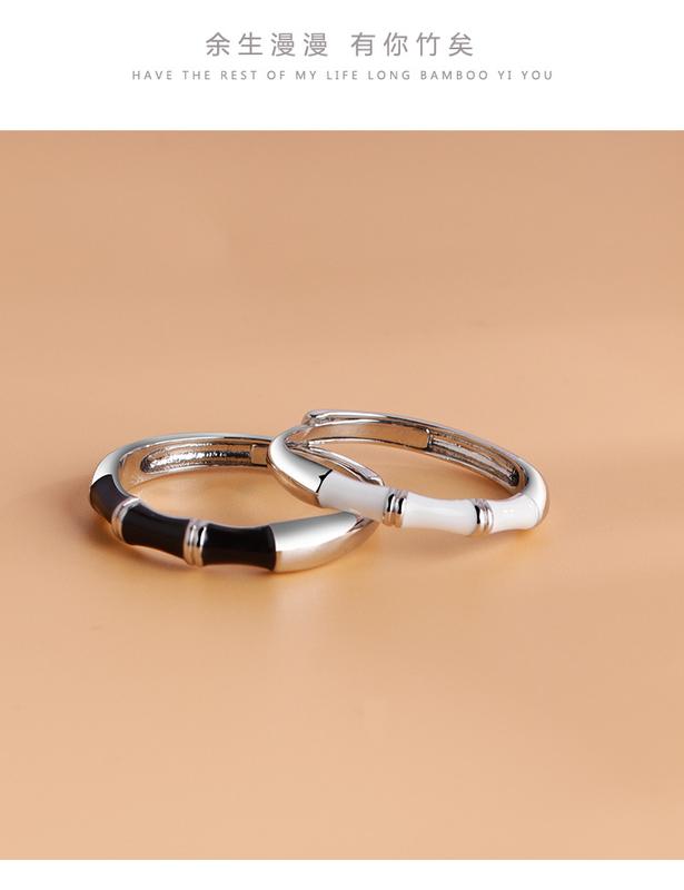 Product Introduction of A pair of black and white drip rings with an open finger ring for men and women 5