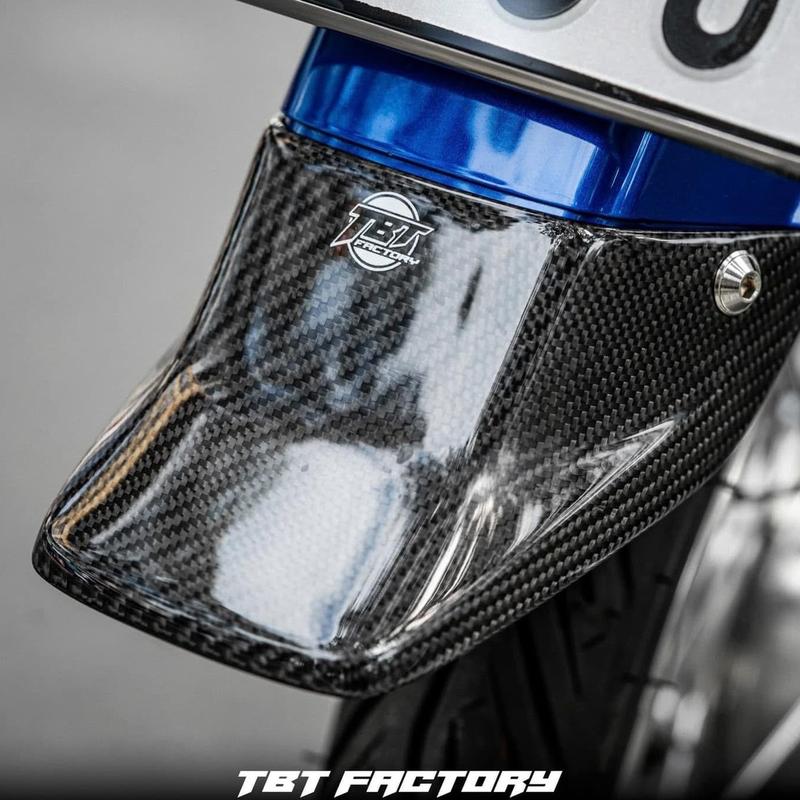 PHỤ TÙNG - ĐUÔI DÈ SAU DREAM TBT - ỐP CARBON NGUYÊN KHỐI