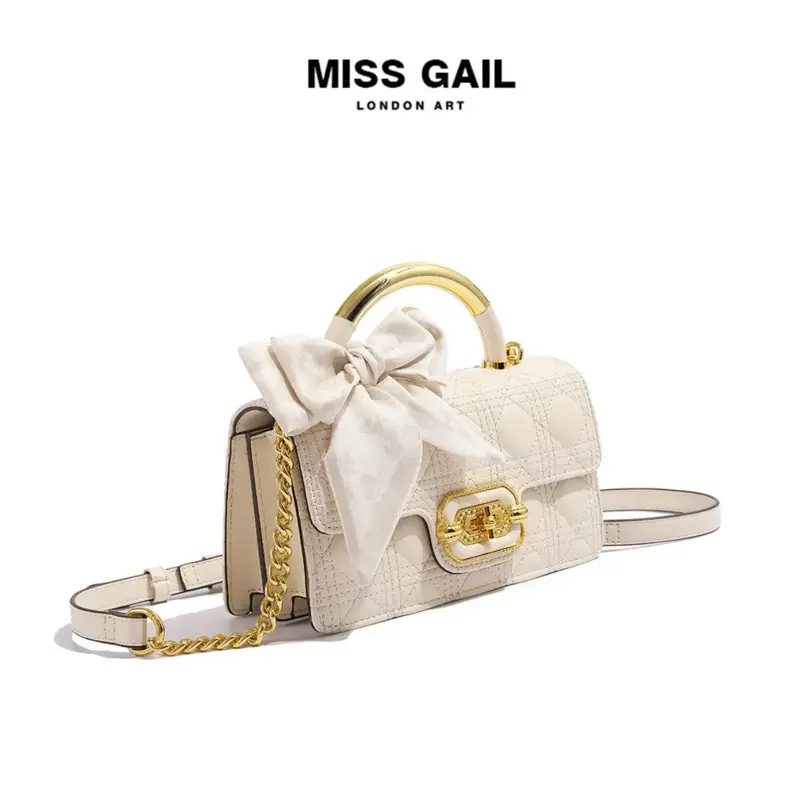 MG6992-1. Túi xách nữ MISS GAIL Store HongKong thiết kế ô trần trám kèm nơ sang trọng, thanh lịch. Đeo vai/ xách tay. Full box hãng.  Bag 1