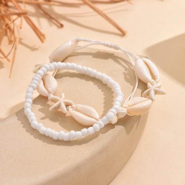 Set 2 vòng tay đi biển mix sao vỏ ốc thật 2
