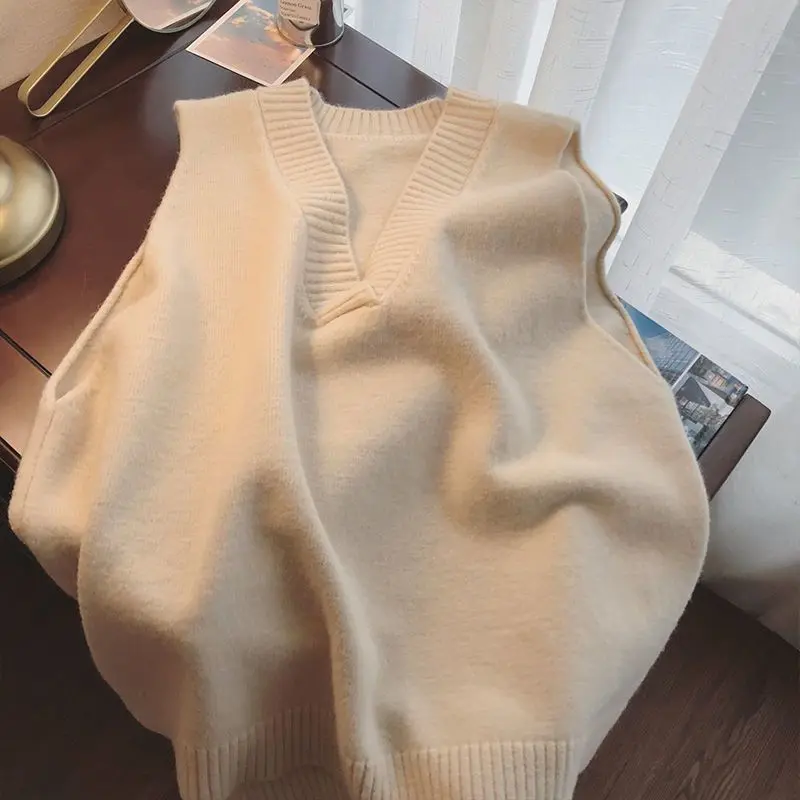 Áo vest dệt kim cổ chữ V nữ mùa thu 2024 mới phong cách Hàn Quốc cổ điển Áo len ngoài áo vest không tay mùa xuân thu Women Top