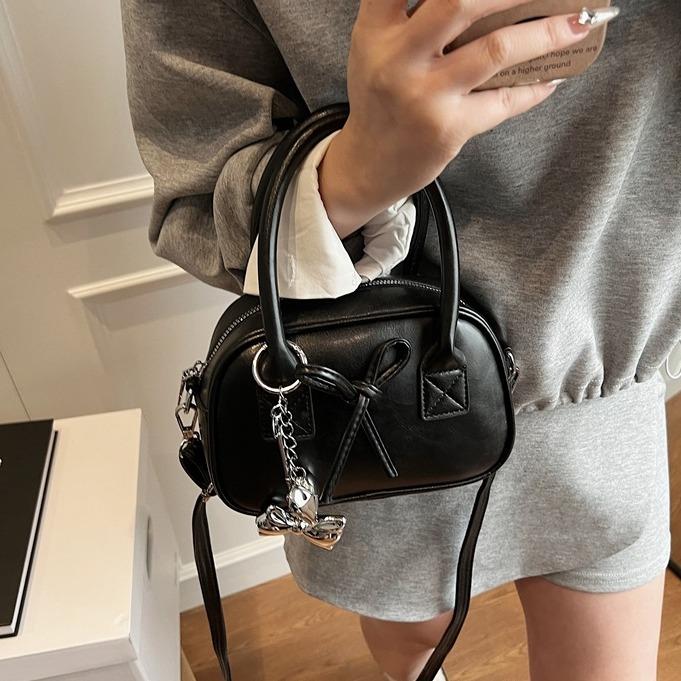 Túi xách nữ cầm tay đeo chéo phối charm kim loại xinh 9