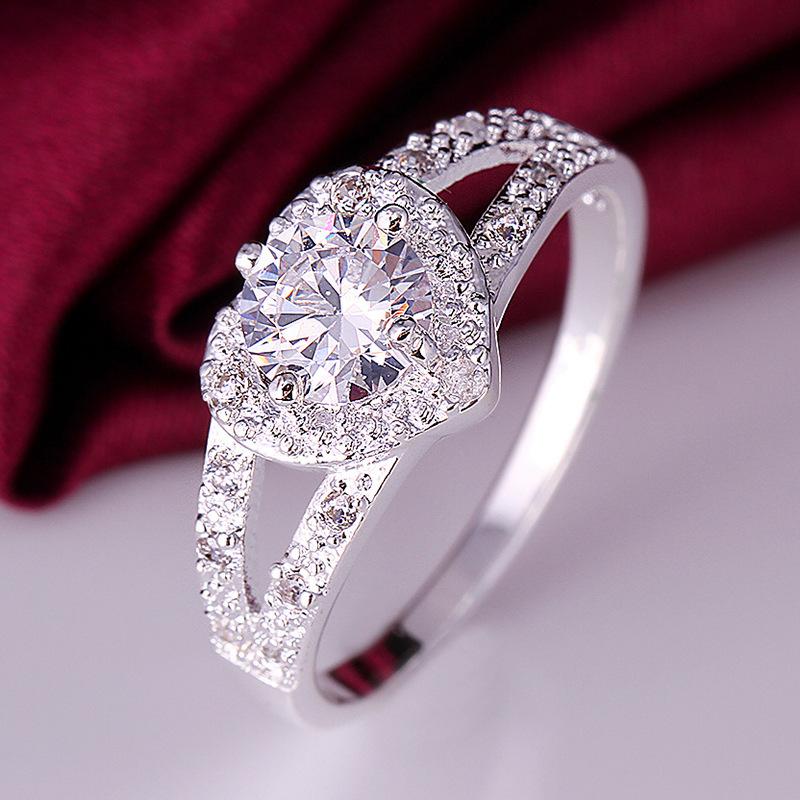 Product Introduction of Fashion Heart-Shaped Ring Hot Sale Ring Silver Plated Women's Ring European and American Zircon Gift All-Match Earrings 1