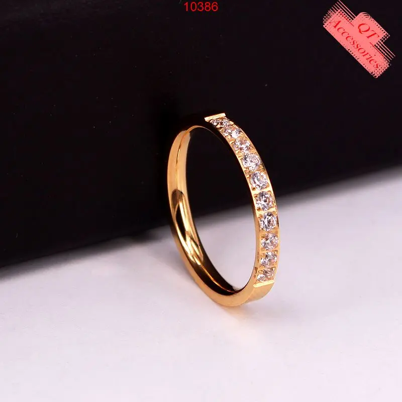 10386 - Nhẫn titan mạ vàng 99k một dải đá nhỏ