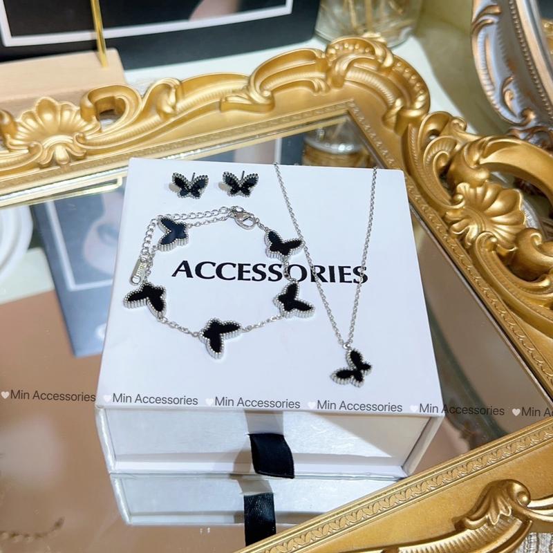 Set khuyên tai vòng cổ lắc tay hồ điệp chất liệu titan cao cấp k đen k han gỉ by Min Accessories