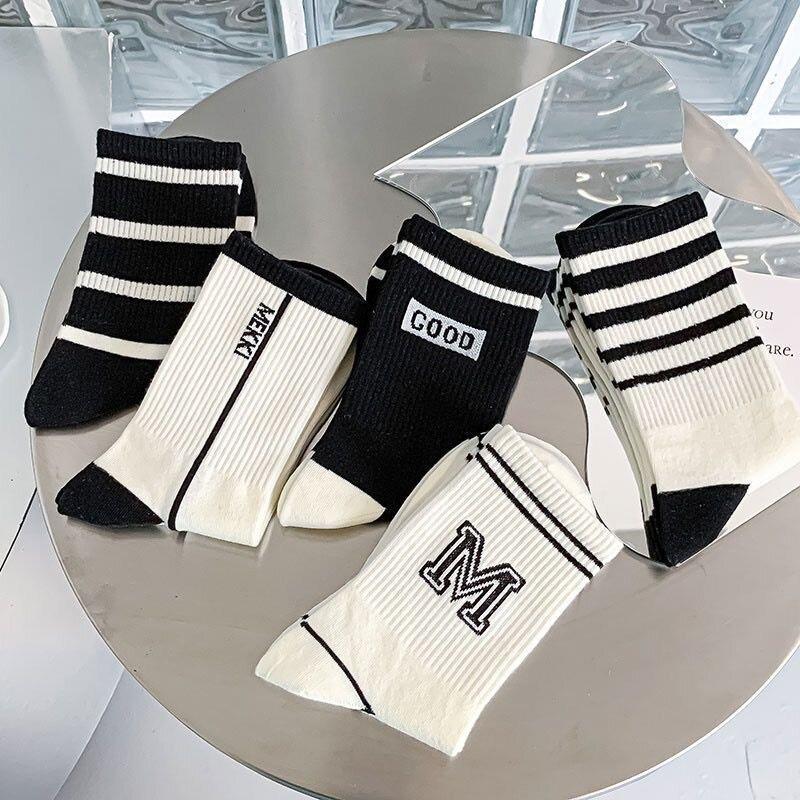 Product Introduction of Simple Black And White Striped Sports Socks 12