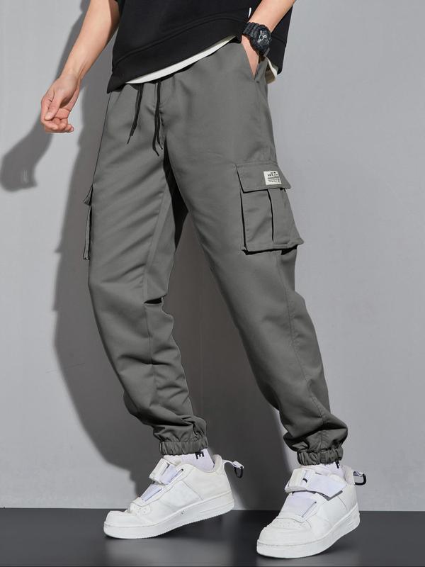 Men's Letter Patched Pocket Cargo Pants, Stylish Loose Drawstring Trousers, Drippy Outfits, Going Out Outfit, Menswear Clothing 4