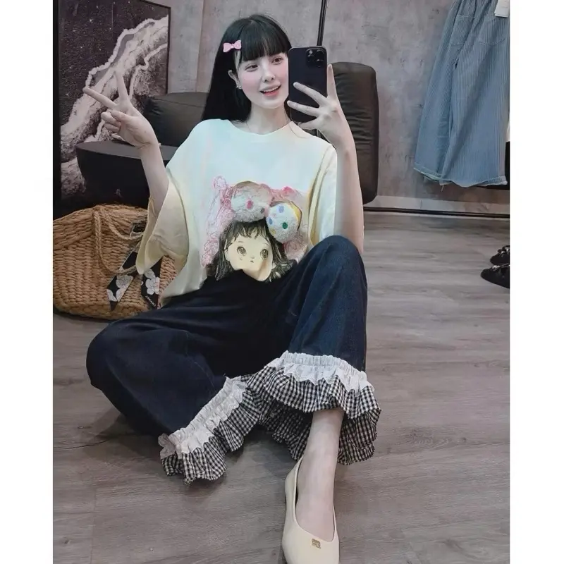 Quần bò dáng loe rộng gấu phôi ren kẻ cách điệu L1 1