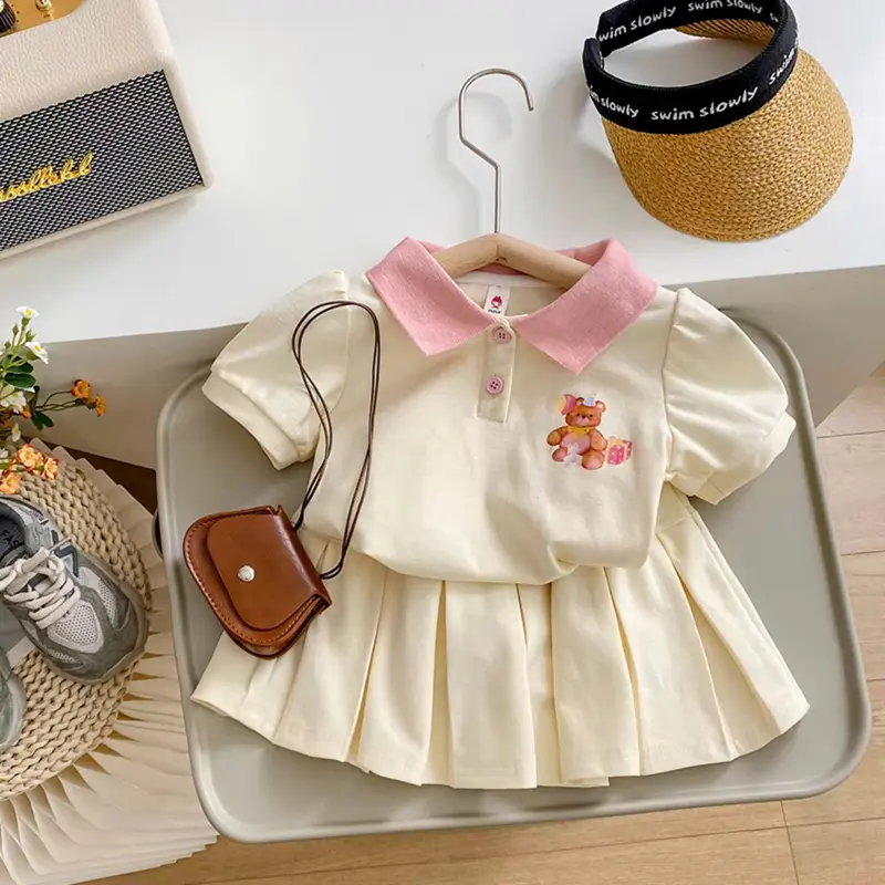 Sét váy cộc tay có cổ , chân váy xếp ly ( có lót trong ) dành cho bé . ( TT ) 1