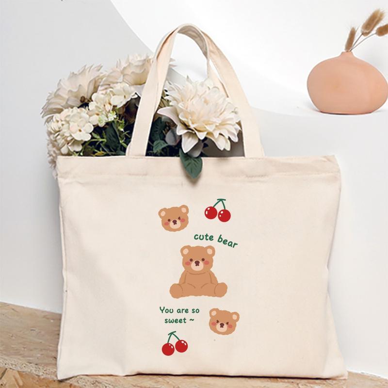 Product Introduction of Cute Cartoon Teddy Bear Printed Canvas Horizontal Handbag Fashionable Versatile One Shoulder Storage Bag 46