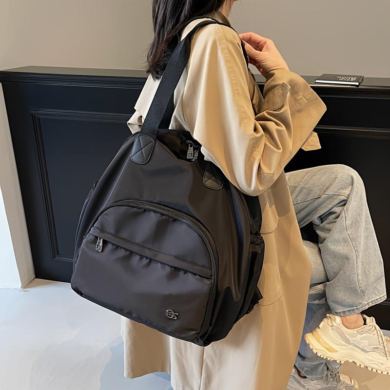 Product Introduction of Large Capacity Commuting Travel Shoulder Bag Fashionable Versatile Backpack Parent Bag Women's Casual Bag Oxford Cloth Handbag Adjustable Strap Zipper Closure 0
