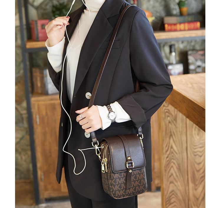 Product Introduction of Sling Bag Luka JMK | Tas Selempang Pocket Wanita Sling Bag JMK | Tas Selempang Handphone Wanita 2 Ruang Model Terbaru Tas Kecil Wanita Untuk Pesta Selempang Wanita Warna Hitam Cokelat Tan Putih Kulit PU 16