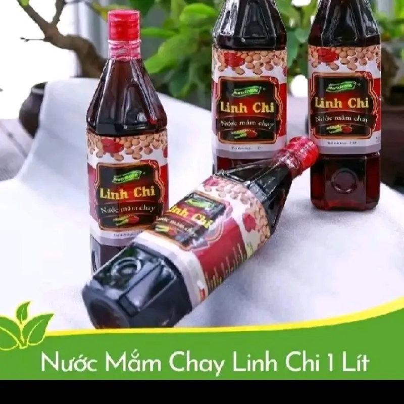 nước mắm linh chi nước mắm thuần chay dùng làm nước chấm hoặc nêm vào thức ăn sau khi nấu chín 4 chai 145 k tặng kèm 2 bịch hạt nêm chay 1