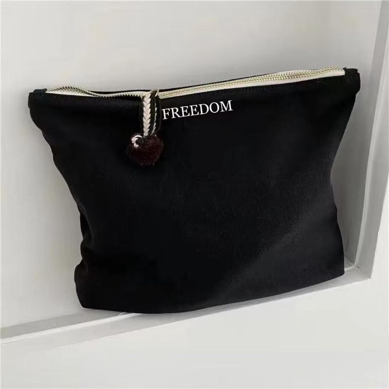Product Introduction of Niche Cute Hand Canvas Makeup Bag Women's Japanese Ins Simple and Portable Large Capacity Skincare Storage Bag 3
