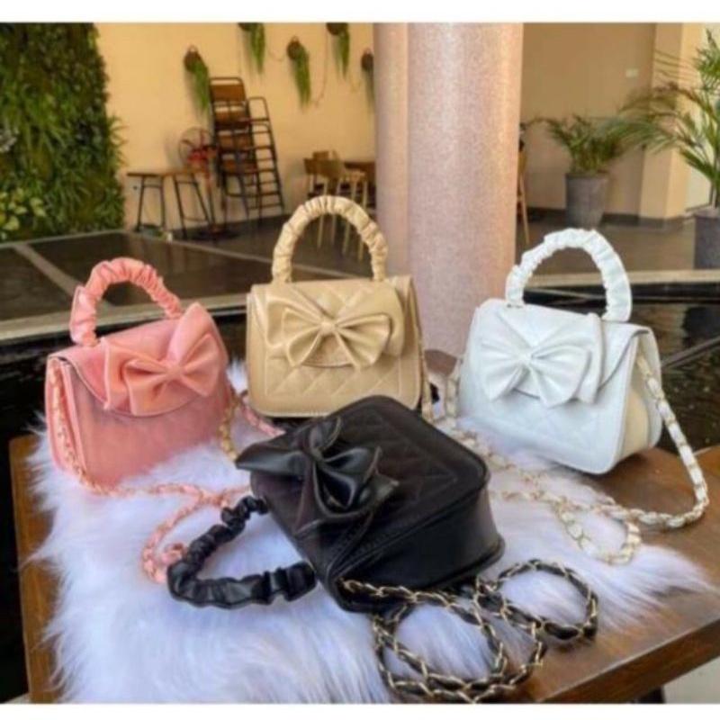 túi xách nữ túi xách đeo chéo cầm tay phối nơ xinh đẹp chất da mềm cao cấp có 4 màu đen trắng hồng nu Bag