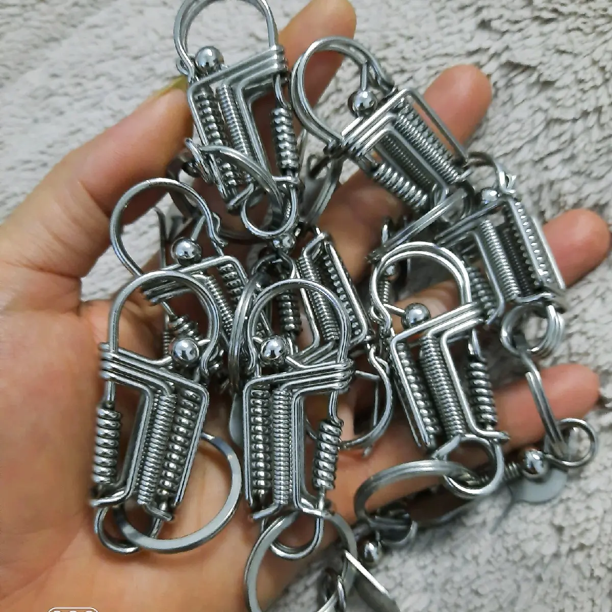 Móc khóa inox lò xo