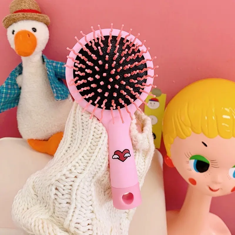 LƯỢC TRÒN KÈM GƯƠNG 2 TRONG 1 HÌNH THÚ DỄ THƯƠNG MÁT XA DA ĐẦU.