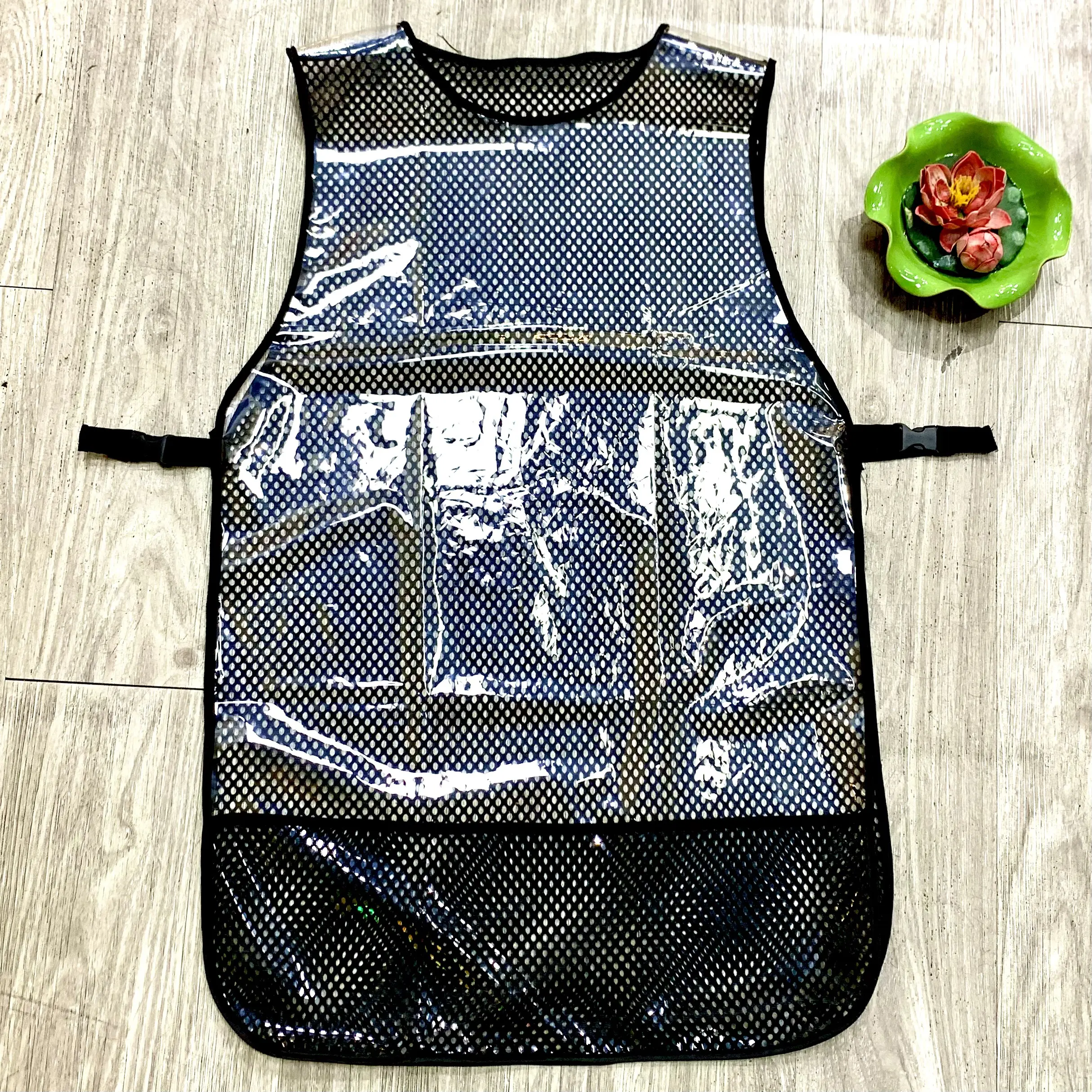Áo bảo vệ cho thợ cắt tóc