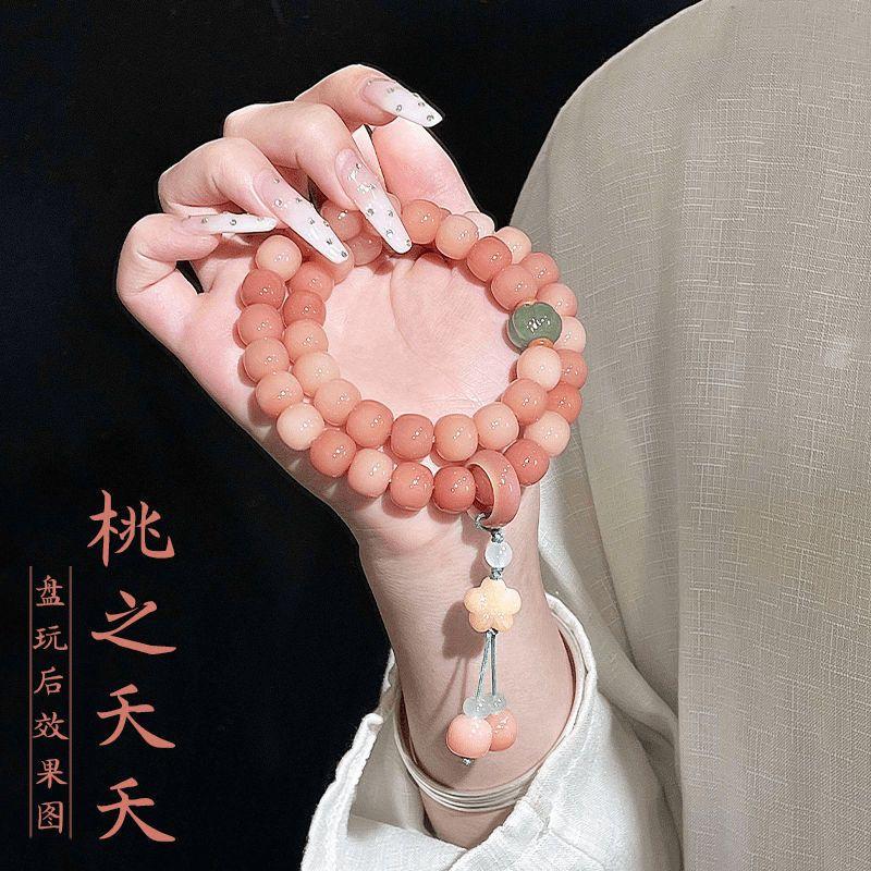 Product Introduction of Pink white jade bodhi root bracelet Female circular finger soft play bodhi Buddha beads student disk play gradient bracelet 9