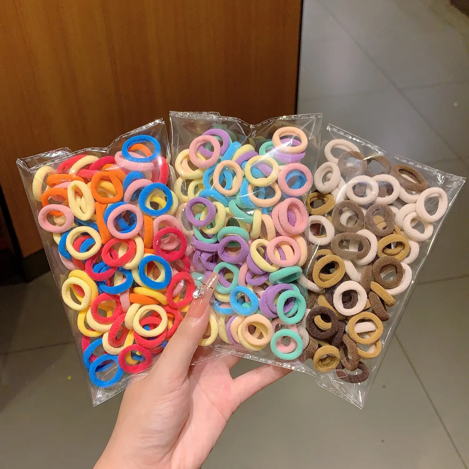 Children's rubber bands that won't damage hair, baby towel hair rings, cute candy-colored thumb hair rings for little girls, hair ties for tying hair, and hair accessories.