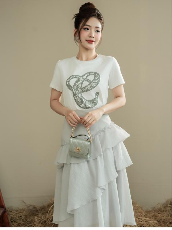 Chân váy tơ ghi xếp tầng chéo Thiết kế Elise mã FS2304087BKORGR