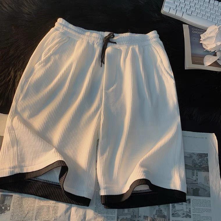 Quần đùi nam nữ có phối LAYER là điềm nhấn chất tổ ong thoáng mát Menswear Ô 4