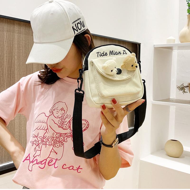 Product Introduction of Túi Đeo Chéo Mini Vải Canvas Kèm Phụ Kiện Đầu Gấu Hoặc 2 Sticker Siêu Dễ Thương Phong Cách Thời Trang 22