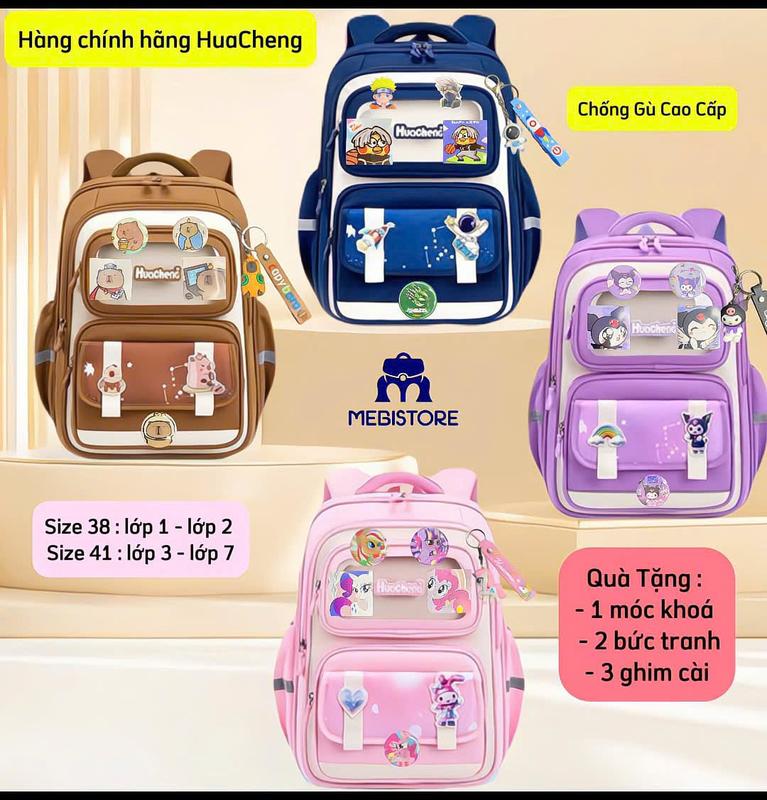 Balo HuaCheng chống gù . chống thấm nước tiểu học kèm các phụ kiện móc khoá ảnh và ghim cài . Siêu nhẹ - MEBISTORE