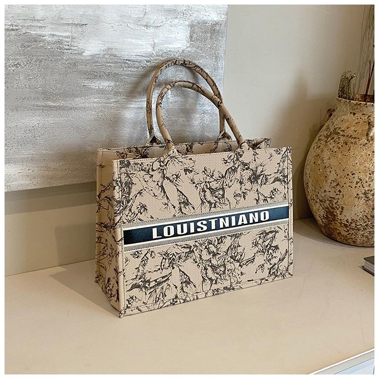 Product Introduction of Trendy Large Capacity Tote Bag for Women 2025 New Fashion Canvas Shoulder Handbag Tote Bag Niche Handbag Wholesale 15