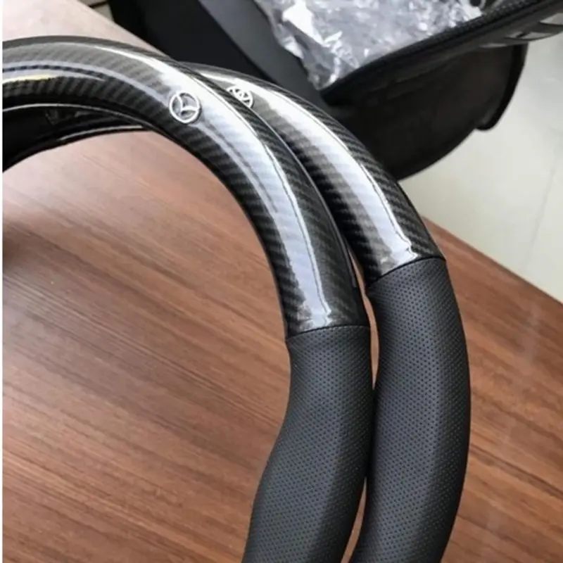 Bọc vô lăng CARBON phối da thoáng khí đủ các hãng xe Toyota-Honda-Hyundai-Mazda-KiA-Ford-Mitshubishi-Chevrolet cao cấp Cacbon 1