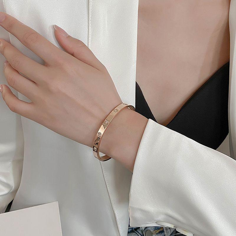 Product Introduction of Light Luxury Bangle Women Jewelry Roman Bangle Stainless Steel Bracelet Roman Couple For Cuff Bracelet 4