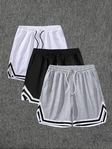 Men's Contrast Binding Drawstring Waist Shorts, Casual Loose Elastic Waist Pocket Asymmetrical Hem Track Bottoms for Summer, Breathable Men's Clothes for Daily Wear, National Day Clothing