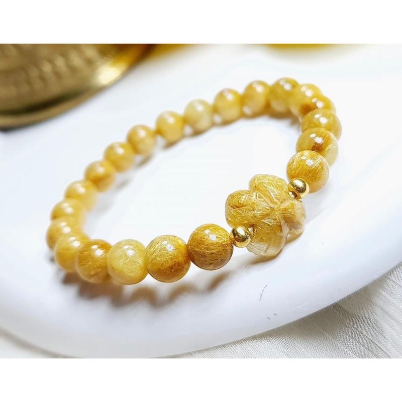 Product Introduction of Vòng tay đá Thach_Anh_Toc_Vàng tự nhiên mic cỏ 4 lá may mắn tài lộc 1
