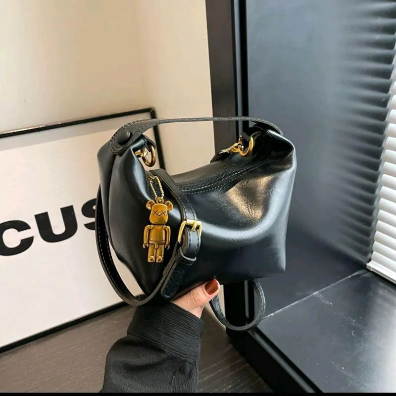 Túi da nâu ánh hồng da mềm đanh kèm khóa gấu kim loại dáng giọt nước Bag Nữ Kem 1