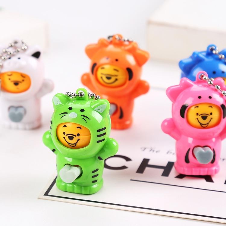 Móc khoá búp bê gấu pooh bấm thay đổi khuôn mặt (1539MKN)