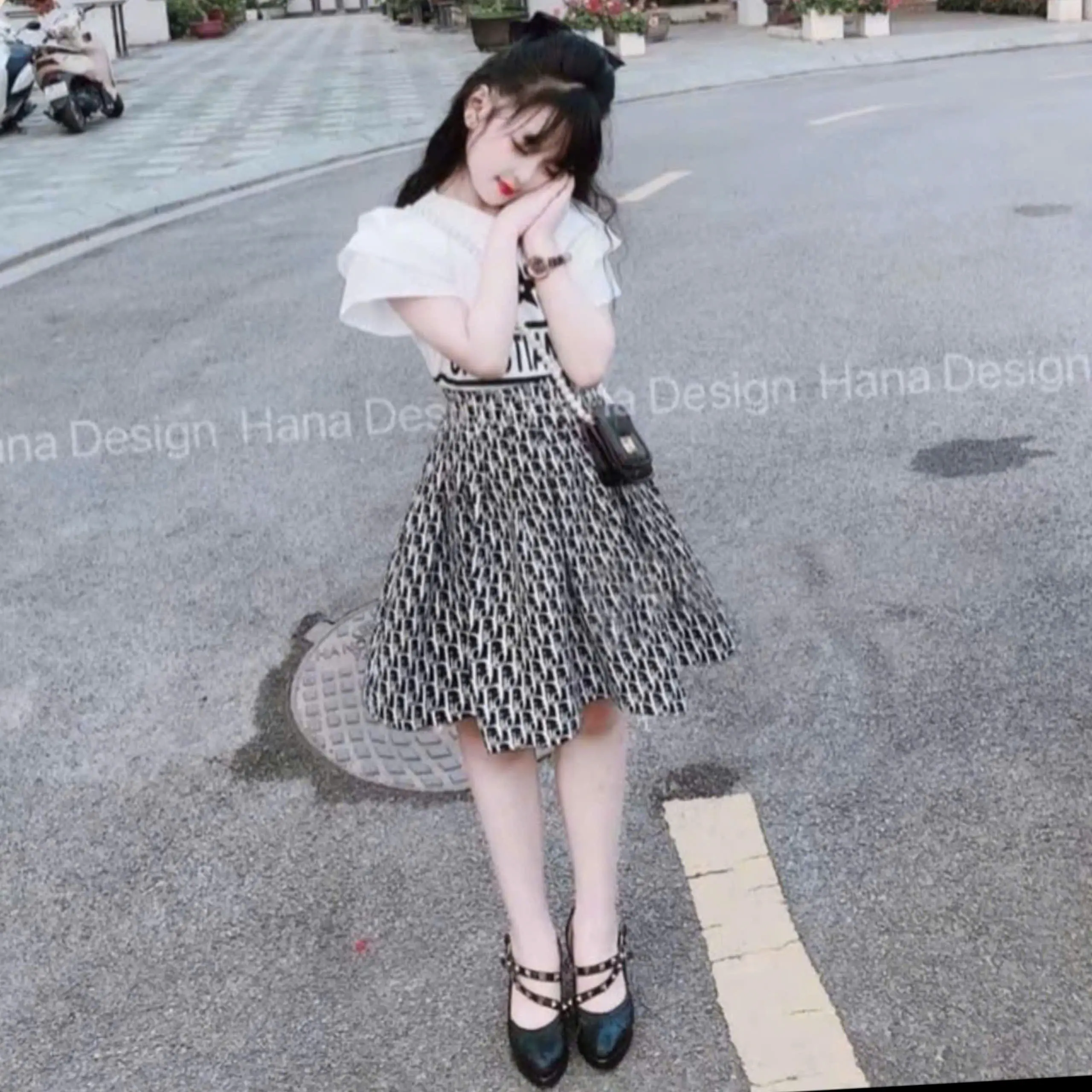Mã S2: (20kg - 50kg) Sét áo thun cotton hình sao và chân váy chất cotton lạnh họa tiết trắng đen cho bé gái