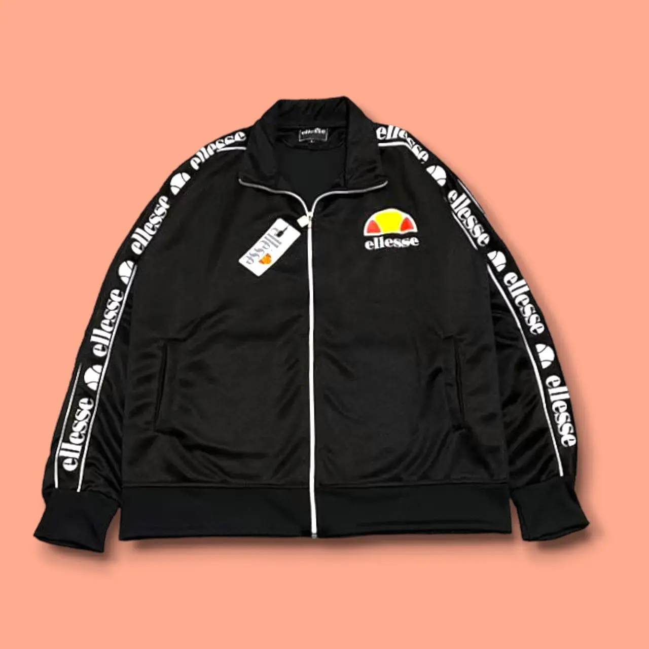 Ellesse Tapped Jacket Tracktop - Jacket Tracktop Casual Pria wanita (unisex) Ellesse Tapped Hitam Logo Full Tag Jaket Distro Keren Motif