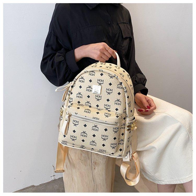 Product Introduction of 2024 factory wholesale Women's backpack Korean-style fashion Pu retro classic presopbackpack letter rivet women's backpack 8