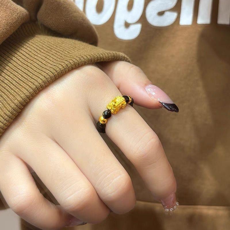 Product Introduction of Simple COH Love Pixiu Ring Golden Lucky Beads Lucky Couple Ring Niche Woven Ring 1
