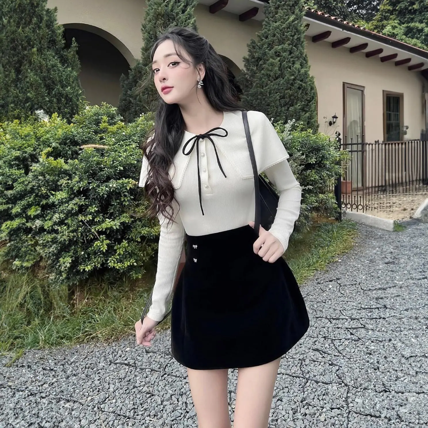 Set thiết kế cách điệu áo len tăm cầu vai kết hợp chân váy nơ, Set áo dài tay chân váy ngắn Nữ Kem Women Top by Thời Trang News