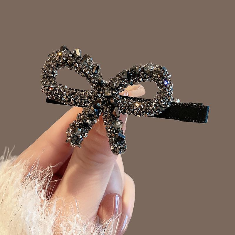 A139  kẹp mái chữ nơ đính đá điệu đà