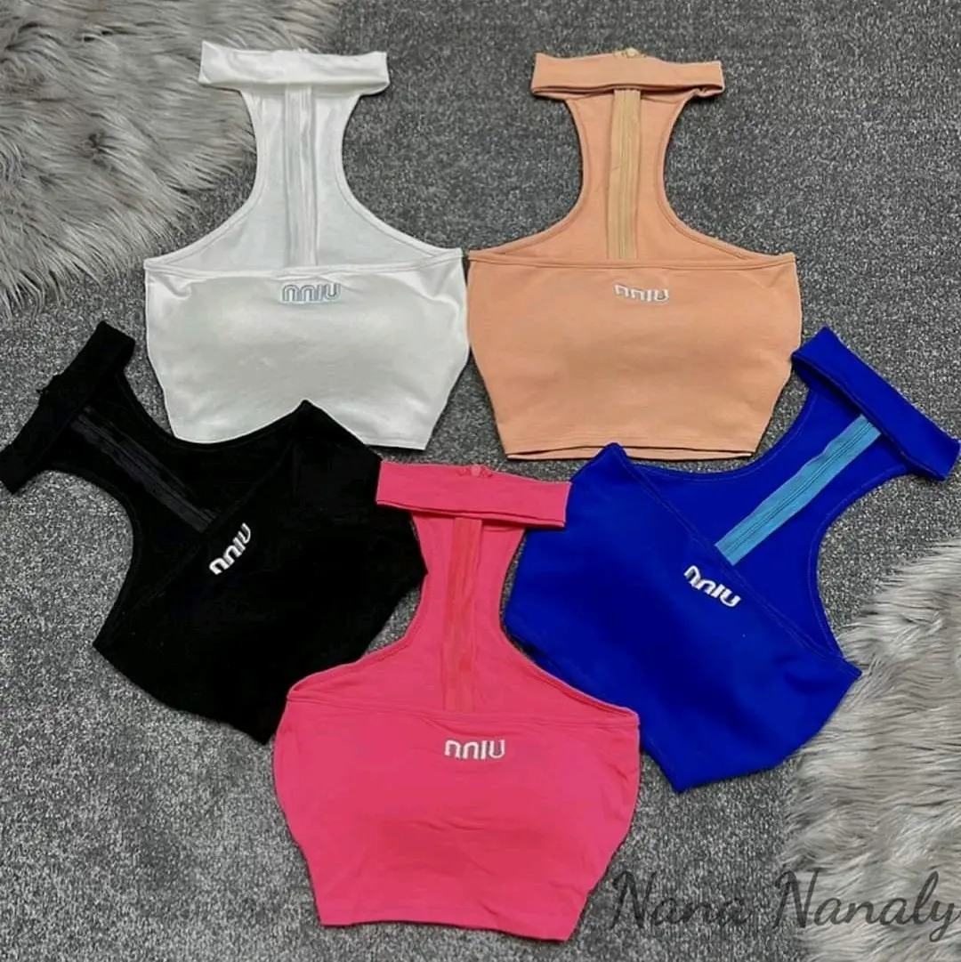 Áo chốt cơ chữ miu có khoá kéo sau . phom crt có mút đệm