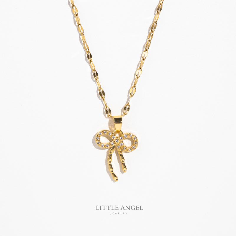 Product Introduction of Bow Pendant Necklace with Dancing Chain - RXD-136 Minimalist Stainless Steel Non Tarnish double platted Hypoallergenic 22