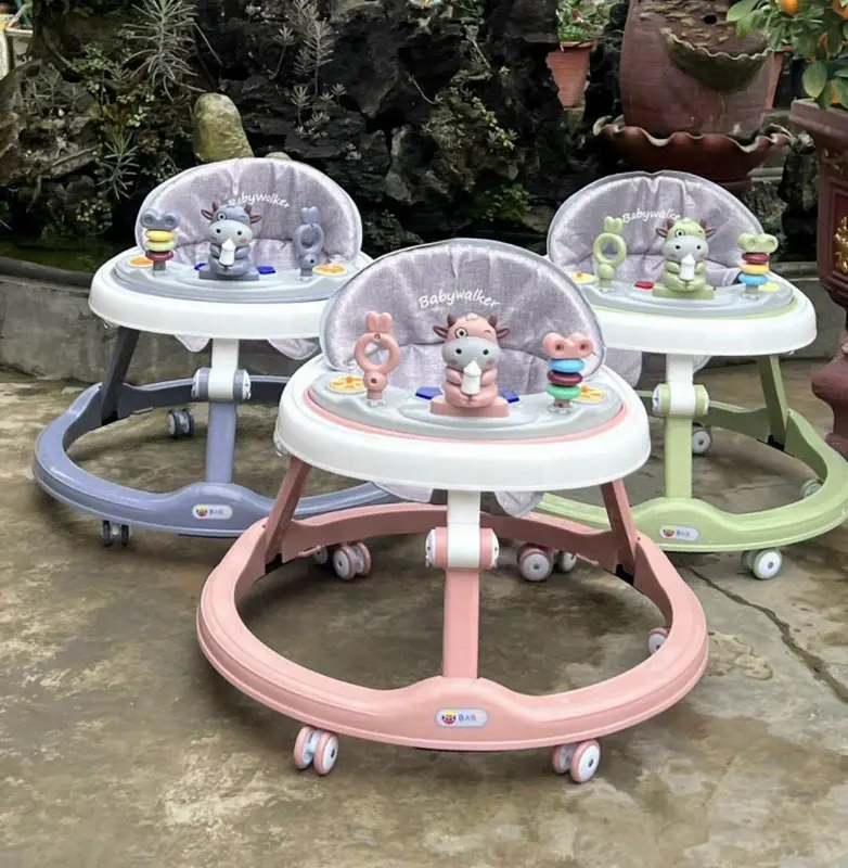 Xe tròn tập đi dành cho bé con bò sữa mã 603 ghế  lắc lư 1