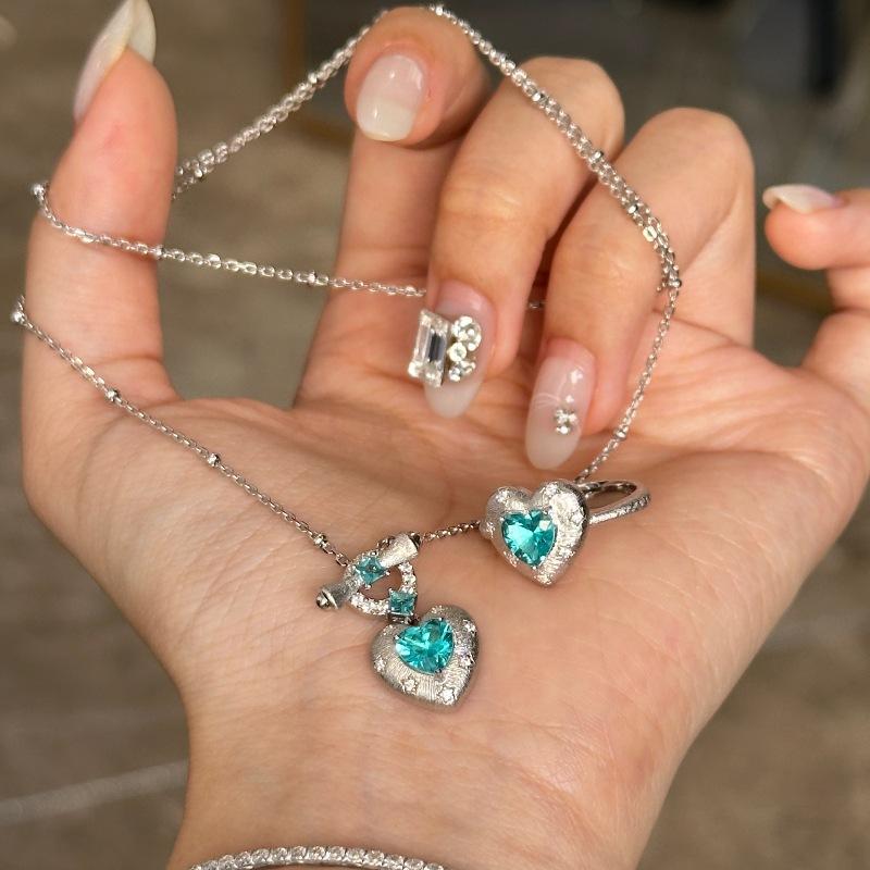 Product Introduction of Mild Luxury Retro High-Grade Paraiba Brushed Love Heart-Shaped Ring Necklace Ear Stud Inlaid Zircon Exquisite Women's Suit 2
