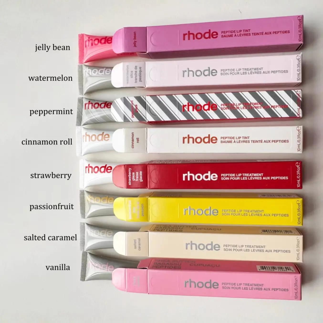 Rhode Glossy Lip Tint in Ribbon/Toast shades, moisturizing