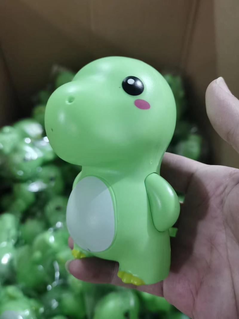 Product Introduction of Little Dinosaur Water machine Little Milk Dragon Press Spray Water Sprinkler Boys Girls Water machine Fight Children's Toy Beach Toy 1