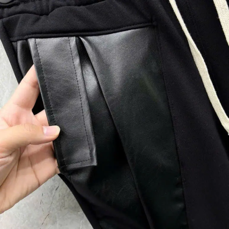 Quần nỉ dài vá da chất vải thun lạnh túi phối da bo chun ống quần dành cho nam nữ fom unisex 1
