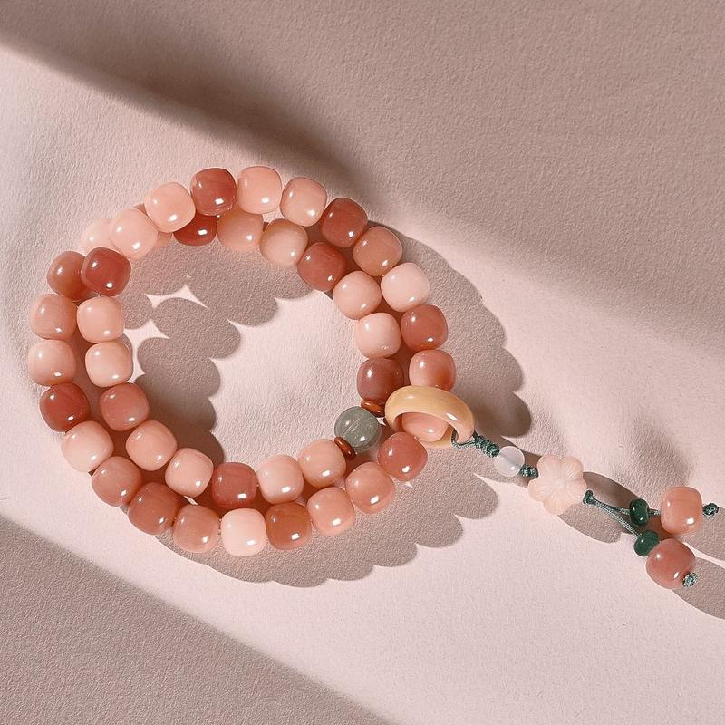 Product Introduction of Pink white jade bodhi root bracelet Female circular finger soft play bodhi Buddha beads student disk play gradient bracelet 11